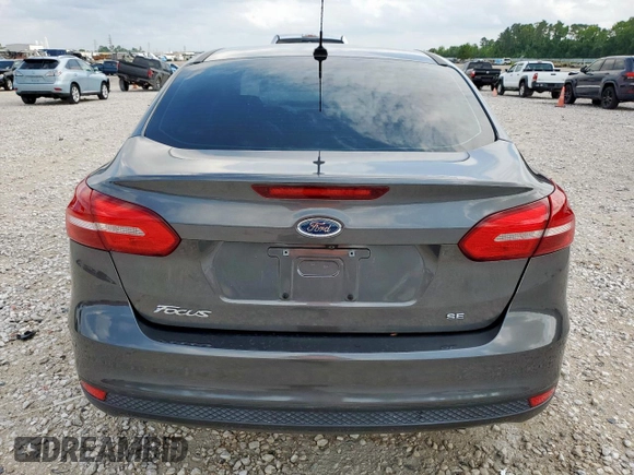 2017 Ford Focus SE with VIN 1FADP3F22HL303420, listed as a Copart auction lot 58932675 with 44,707 mi miles and Salvage title. Bid and sale history available at DreamBid. Image 6.