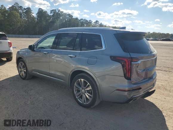 2023 Cadillac XT6 FWD Premium Luxury with VIN 1GYKPCRS0PZ231233, listed as a Copart auction lot 73210244 with 14,604 mi miles and Salvage Title. Bid and sale history available at carsss.com. Image 2.