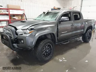 2016 Toyota Tacoma SR with VIN 3TMCZ5AN1GM019769, listed as a IAAI auction lot 41804693 with 157,138 mi miles. Bid and sale history available at carsss.com. Image 17.