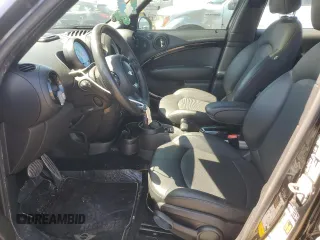 2013 MINI Countryman S ALL4 z VIN WMWZC5C54DWP34353, wystawiony jako Copart lot #57059295 z przebiegiem 154 012 mil mil oraz Szkoda całkowita • Salvage title. Historia ofert i sprzedaży dostępna na DreamBid. Obrazek 7.