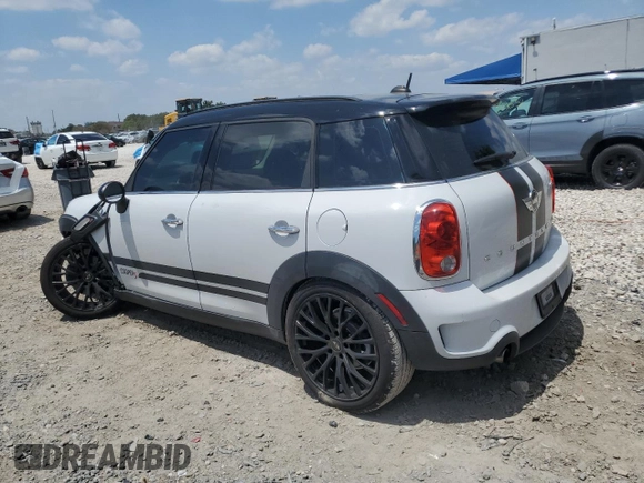 2016 MINI Countryman S with VIN WMWZC3C53GWT08355, listed as a Copart auction lot 53240215 with 62,674 mi miles and Salvage Title. Bid and sale history available at DreamBid. Image 2.