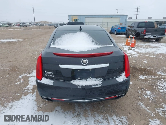 2013 Cadillac XTS Luxury with VIN 2G61R5S30D9100094, listed as a IAAI auction lot 41601711 with 191,068 mi miles and . Bid and sale history available at DreamBid. Image 16.