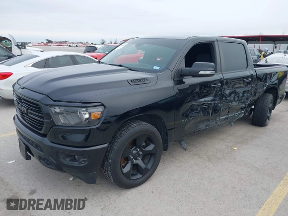 2019 Ram 1500 Big Horn z VIN 1C6RREFT1KN891182, wystawiony jako IAAI lot #41634042 z przebiegiem 128 972 mil mil oraz . Historia ofert i sprzedaży dostępna na DreamBid. Obrazek 2.
