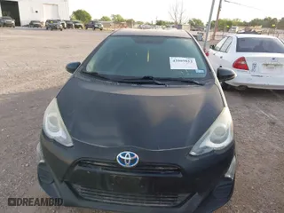 2016 Toyota Prius c One with VIN JTDKDTB35G1122931, listed as a IAAI auction lot 42009812 with 80,970 mi miles. Bid and sale history available at carsss.com. Image 11.