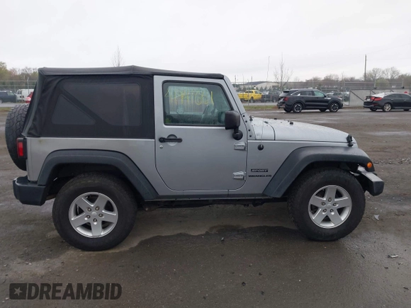 2015 Jeep Wrangler Sport with VIN 1C4AJWAG6FL501160, listed as a IAAI auction lot 41941661 with 134,842 mi miles. Bid and sale history available at carsss.com. Image 13.