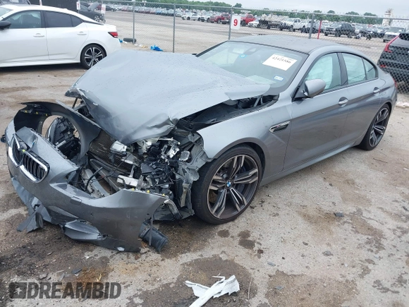 2014 BMW M6 with VIN WBS6C9C54EDV73926, listed as a IAAI auction lot 42421586 with 82,216 mi miles and . Bid and sale history available at DreamBid. Image 18.