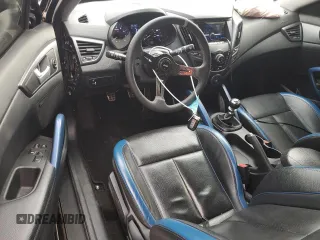 2013 Hyundai Veloster Turbo z VIN KMHTC6AE7DU152689, wystawiony jako Copart lot #51569125 z przebiegiem 102 152 mil mil oraz Szkoda całkowita • Salvage title. Historia ofert i sprzedaży dostępna na DreamBid. Obrazek 8.