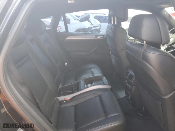 2011 BMW X6 M with VIN 5YMGZ0C54BLK13876, listed as a Copart auction lot 68567774 with 0 mi miles and Salvage Title. Bid and sale history available at carsss.com. Image 11.