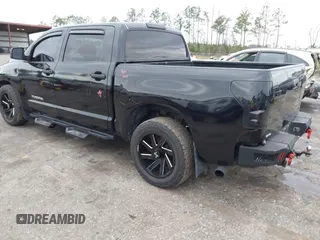 2012 Toyota Tundra 4WD Truck with VIN 5TFDW5F14CX268378, listed as a IAAI auction lot 41412922 with 148,763 mi miles. Bid and sale history available at carsss.com. Image 3.