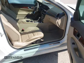 2015 Mercedes-Benz C-Class C 250 with VIN WDDGJ4HB1FG403788, listed as a IAAI auction lot 40495537 with 129,832 mi miles. Bid and sale history available at carsss.com. Image 5.