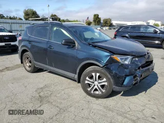 2017 Toyota RAV4 LE with VIN JTMBFREVXHJ146587, listed as a Copart auction lot 64794935 with 92,192 mi miles and Salvage title. Bid and sale history available at DreamBid. Image 4.