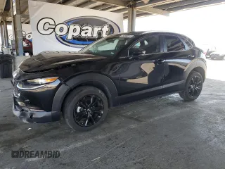 2024 Mazda CX-30 S Select Sport with VIN 3MVDMBBM0RM699317, listed as a Copart auction lot 63411325 with 30,364 mi miles and Clean title. Bid and sale history available at DreamBid. Image 1.