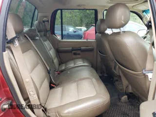 2004 Ford Explorer Sport Trac XLS z VIN 1FMDU77K44UA34720, wystawiony jako Copart lot #55726075 z przebiegiem 192 547 mil mil oraz Szkoda całkowita • Salvage title. Historia ofert i sprzedaży dostępna na DreamBid. Obrazek 10.