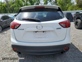 2016 Mazda CX-5 Grand Touring with VIN JM3KE2DY0G0804354, listed as a Copart auction lot 50311185 with 105,588 mi miles and Salvage Title. Bid and sale history available at carsss.com. Image 6.