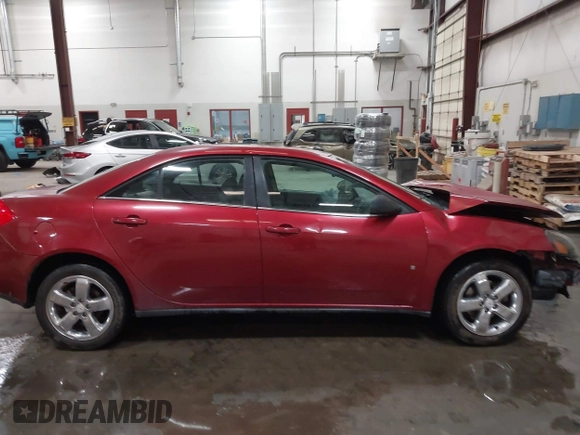 2008 Pontiac G6 1SV Value Leader z VIN 1G2ZF57BX84123601, wystawiony jako IAAI lot #42152501 z przebiegiem Nie podano mil oraz . Historia ofert i sprzedaży dostępna na DreamBid. Obrazek 13.