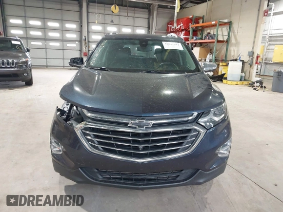 2019 Chevrolet Equinox Premier z VIN 3GNAXNEVXKS500672, wystawiony jako IAAI lot #42042922 z przebiegiem 77 440 mil mil oraz . Historia ofert i sprzedaży dostępna na DreamBid. Obrazek 13.
