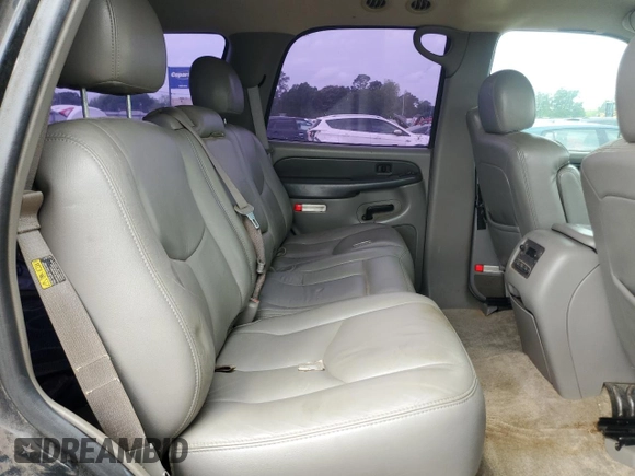 2003 Chevrolet Tahoe Z71 z VIN 1GNEK13Z13R301464, wystawiony jako Copart lot #53905395 z przebiegiem 165 360 mil mil oraz Szkoda całkowita • Salvage title. Historia ofert i sprzedaży dostępna na DreamBid. Obrazek 11.