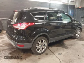2014 Ford Escape SE with VIN 1FMCU9GX7EUA80983, listed as a IAAI auction lot 41504942 with 133,952 mi miles. Bid and sale history available at carsss.com. Image 4.