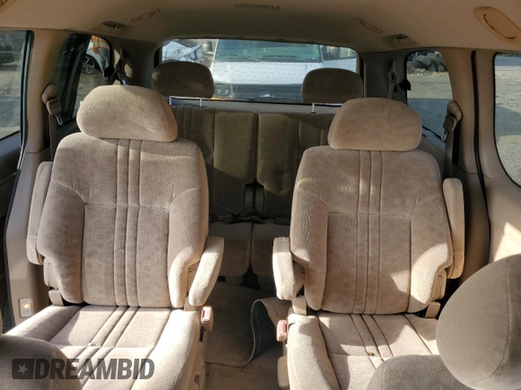 2001 Toyota Sienna LE with VIN 4T3ZF13C51U345619, listed as a Copart auction lot 71761094 with 165,000 mi miles and Salvage Title. Bid and sale history available at carsss.com. Image 10.