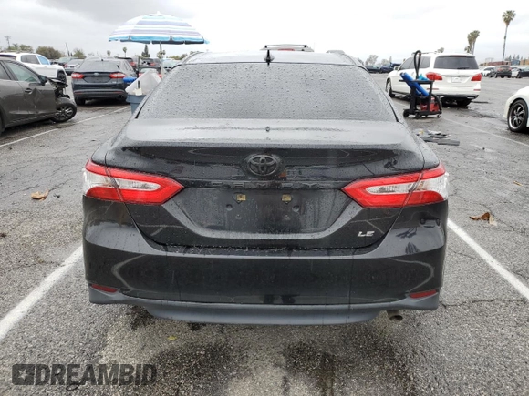 2020 Toyota Camry LE with VIN 4T1C11AK6LU330542, listed as a Copart auction lot 48256735 with 149,076 mi miles and Salvage Title. Bid and sale history available at carsss.com. Image 6.
