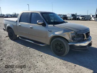 2003 Ford F-150 XLT with VIN 1FTRW07623KB92840, listed as a Copart auction lot 48603105 with 145,516 mi miles and Salvage Title. Bid and sale history available at carsss.com. Image 4.