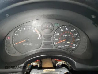 1999 Mitsubishi 3000GT z VIN JA3AM44H3XY001394, wystawiony jako Copart lot #75942814 z przebiegiem 75 146 mil mil oraz Tytuł czysty. Historia ofert i sprzedaży dostępna na DreamBid. Obrazek 9.