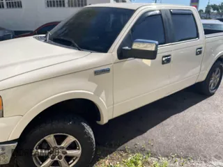 2007 Ford F-150 XLT with VIN 1FTPW12V87FB35617, listed as a IAAI auction lot 41970910 with 244,784 mi miles. Bid and sale history available at carsss.com. Image 2.