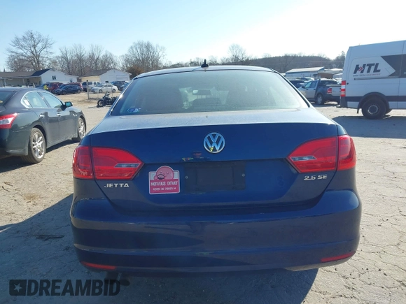 2013 Volkswagen Jetta SE with VIN 3VWDX7AJ7DM208972, listed as a IAAI auction lot 41653416 with 173,386 mi miles and . Bid and sale history available at DreamBid. Image 12.
