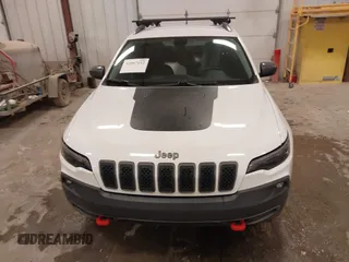 2019 Jeep Cherokee Trailhawk with VIN 1C4PJMBX4KD390061, listed as a IAAI auction lot 42007112 with 72,227 mi miles and . Bid and sale history available at DreamBid. Image 12.