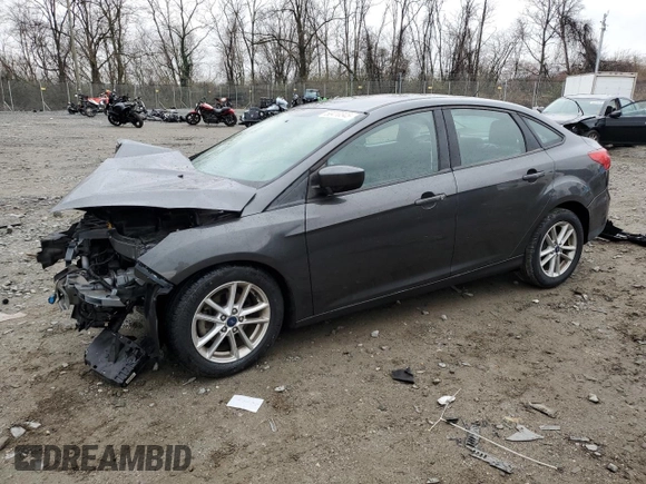 2018 Ford Focus SE with VIN 1FADP3F29JL206477, listed as a Copart auction lot 50410345 with 70,955 mi miles and Salvage Title. Bid and sale history available at DreamBid. Image 1.