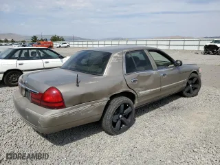 2005 Mercury Grand Marquis GS with VIN 2MEFM74W75X627162, listed as a Copart auction lot 64709124 with 118,697 mi miles and Salvage Title. Bid and sale history available at carsss.com. Image 3.