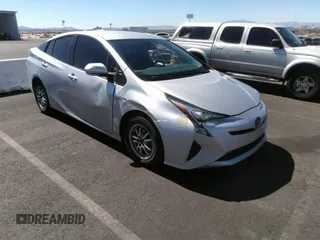 2017 Toyota Prius Two z VIN JTDKBRFU1H3551324, wystawiony jako IAAI lot #41893385 z przebiegiem 305 445 mil mil oraz . Historia ofert i sprzedaży dostępna na DreamBid. Obrazek 1.