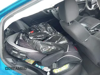 2015 Ford Fiesta SE z VIN 3FADP4EJ9FM133020, wystawiony jako IAAI lot #42302738 z przebiegiem 115 669 mil mil oraz . Historia ofert i sprzedaży dostępna na DreamBid. Obrazek 8.