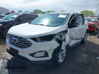 2020 Ford Edge SEL z VIN 2FMPK4J9XLBA07663, wystawiony jako IAAI lot #42115904 z przebiegiem 45 385 mil mil oraz . Historia ofert i sprzedaży dostępna na DreamBid. Obrazek 18.