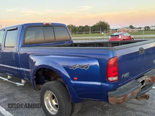 2003 Ford F-350 XL with VIN 1FTWW33P23EC02154, listed as a Copart auction lot 63713235 with 260,340 mi miles and Clean title. Bid and sale history available at DreamBid. Image 3.