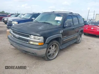 2002 Chevrolet Tahoe LT with VIN 1GNEC13Z22J335701, listed as a IAAI auction lot 42134758 with 250,668 mi miles and . Bid and sale history available at DreamBid. Image 2.