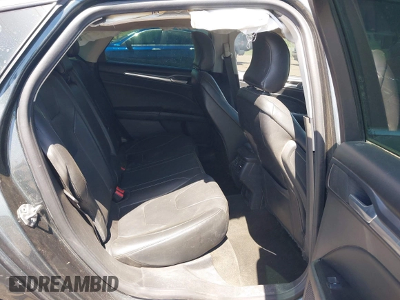 2016 Ford Fusion Titanium with VIN 3FA6P0K98GR158877, listed as a IAAI auction lot 41994013 with 57,027 mi miles and . Bid and sale history available at DreamBid. Image 8.