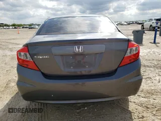 2012 Honda Civic LX с VIN 2HGFB2F54CH595617, выставлен на аукционе Copart как лот 50902745 с пробегом 209 347 миль миль и Списание • Salvage title. История ставок и продаж доступна на DreamBid. Изображение 6.