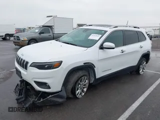 2021 Jeep Cherokee Latitude Lux z VIN 1C4PJMMX4MD221786, wystawiony jako IAAI lot #42432825 z przebiegiem 54 297 mil mil oraz . Historia ofert i sprzedaży dostępna na DreamBid. Obrazek 19.