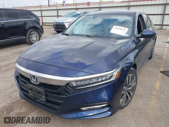 2018 Honda Accord Touring z VIN 1HGCV3F99JA010500, wystawiony jako IAAI lot #41529657 z przebiegiem 46 704 mil mil oraz . Historia ofert i sprzedaży dostępna na DreamBid. Obrazek 17.