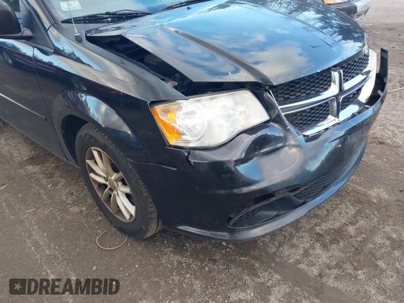 2014 Dodge Grand Caravan SXT with VIN 2C4RDGCG4ER337202, listed as a IAAI auction lot 40781755 with 258,524 mi miles and . Bid and sale history available at DreamBid. Image 13.