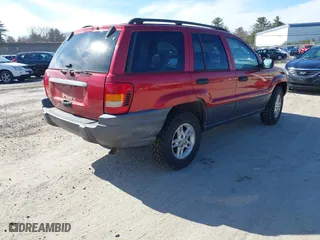 2003 Jeep Grand Cherokee Laredo with VIN 1J4GW48S33C556441, listed as a IAAI auction lot 42026804 with 189,143 mi miles. Bid and sale history available at carsss.com. Image 4.