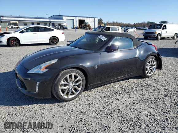 2014 Nissan 370Z Touring with VIN JN1AZ4FH3EM620195, listed as a Copart auction lot 83207104 with 66,974 mi miles and Salvage Title. Bid and sale history available at DreamBid. Image 1.
