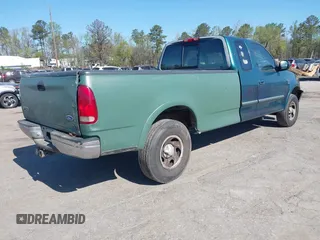 1997 Ford F-150 XL with VIN 1FTDX1861VNA45664, listed as a IAAI auction lot 42005279 with 209,847 mi miles. Bid and sale history available at carsss.com. Image 4.