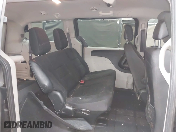 2018 Dodge Grand Caravan SE with VIN 2C4RDGBG8JR230875, listed as a IAAI auction lot 42062774 with 194,781 mi miles and . Bid and sale history available at DreamBid. Image 8.