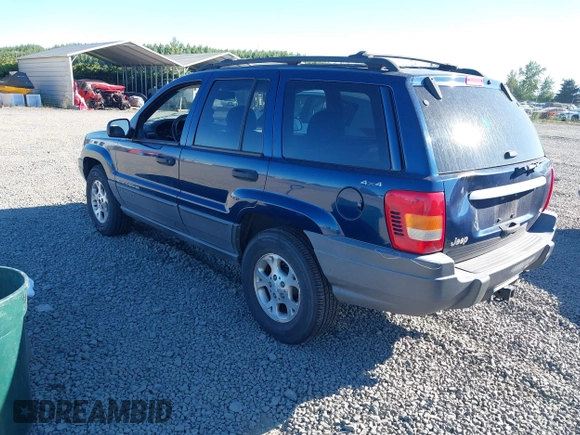 2001 Jeep Grand Cherokee Laredo with VIN 1J4GW48N31C727194, listed as a IAAI auction lot 42703915 with 176,896 mi miles and . Bid and sale history available at DreamBid. Image 3.