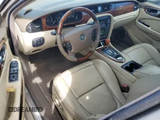 2005 Jaguar XJ with VIN SAJWA79C05SG46913, listed as a Copart auction lot 75092794 with 0 mi miles and Salvage Title. Bid and sale history available at carsss.com. Image 8.