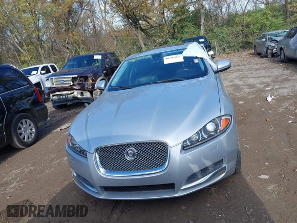 2013 Jaguar XF V6 SC with VIN SAJWJ0EF6D8S81203, listed as a IAAI auction lot 40783947 with 77,727 mi miles. Bid and sale history available at carsss.com. Image 6.