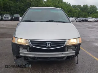 2004 Honda Odyssey EX-L with VIN 5FNRL18934B076486, listed as a IAAI auction lot 42315160 with 209,467 mi miles and . Bid and sale history available at DreamBid. Image 6.