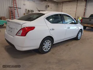 2019 Nissan Versa Sedan SV with VIN 3N1CN7AP1KL881058, listed as a IAAI auction lot 42032907 with 106,842 mi miles. Bid and sale history available at carsss.com. Image 4.